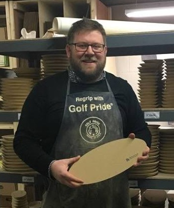 Jeff Rottman, founder of GR Pottery Forms, holding a pottery form