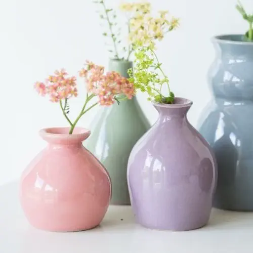 BOTZ stoneware glazes showing a selection of fired ceramic colours and effects including glossy, matt, speckled, crackle and reactive finishes
