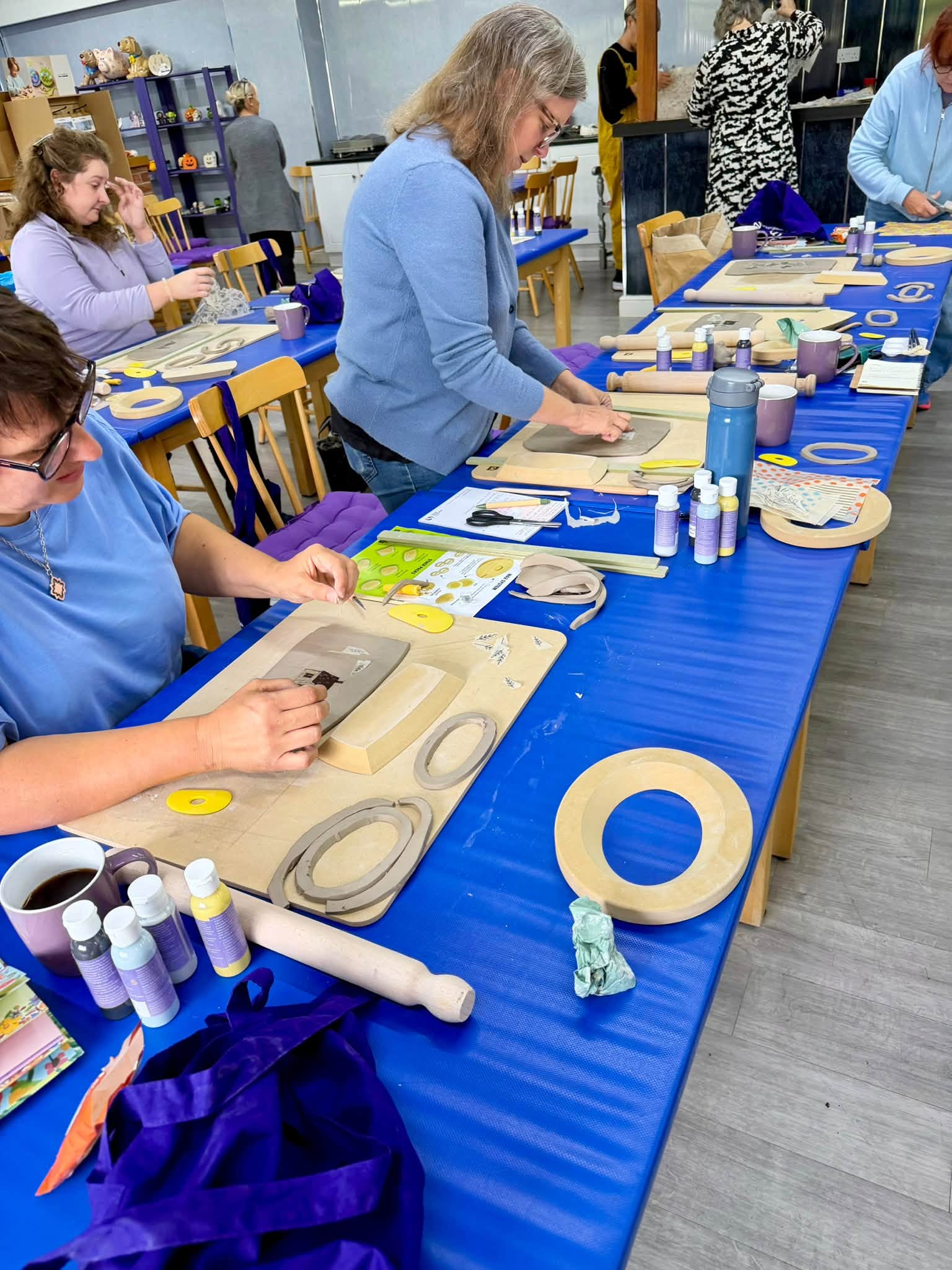 Workshop attendees creating clay pieces with GR Pottery Forms and handbuilding tools at Studio 70