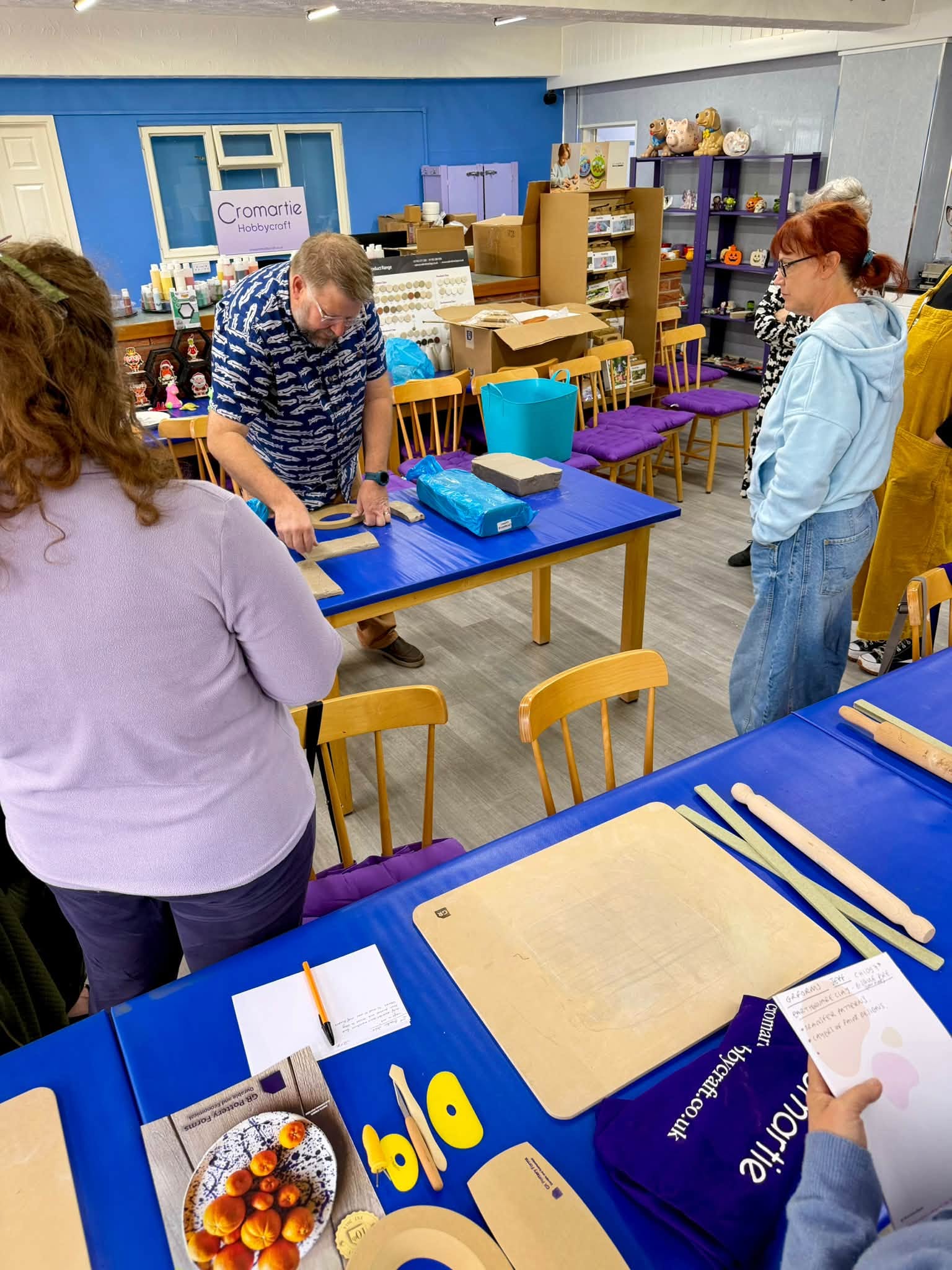 Jeff Rottman demonstrating GR Pottery Forms techniques to attendees at Cromartie