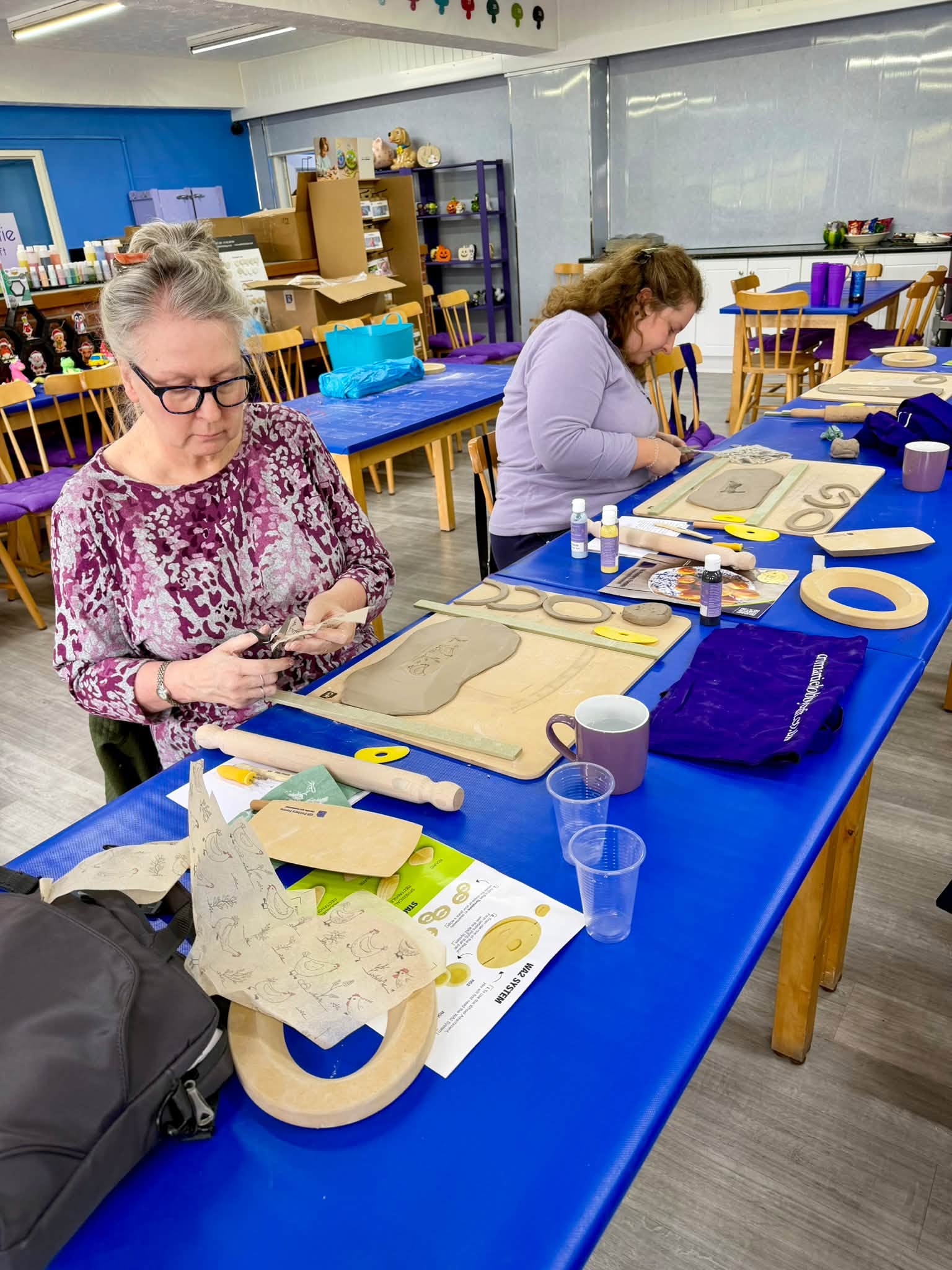 Attendees working on clay projects with GR Pottery Forms during the workshop at Cromartie