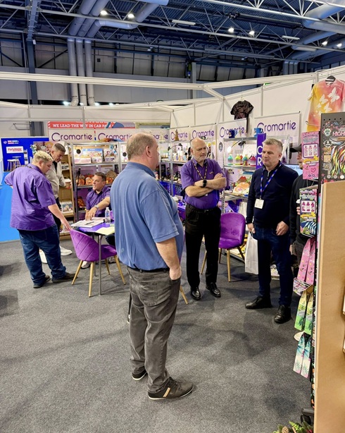 Cromartie Hobbycraft team talking with visitors at the NEC Birmingham during the 2025 Land Leisure and Tourism Show
