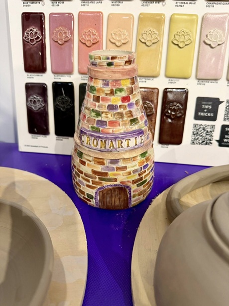 Hand-painted pottery kiln model with Cromartie lettering on display at the Land Leisure and Tourism Show 2025