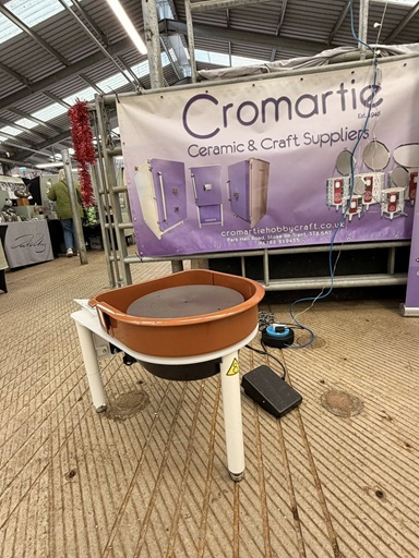 Cromartie exhibition stand with Speedball potter's wheel