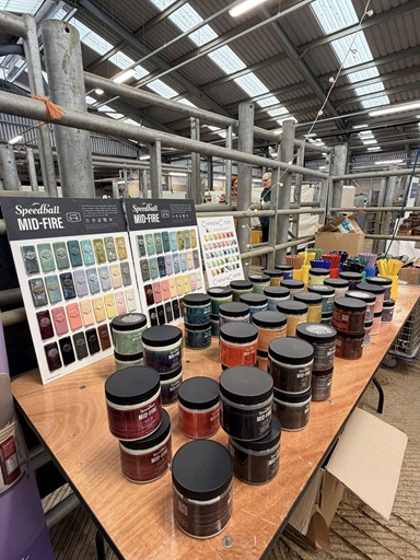 Mid-fire glazes display on the Cromartie stand at Potfest