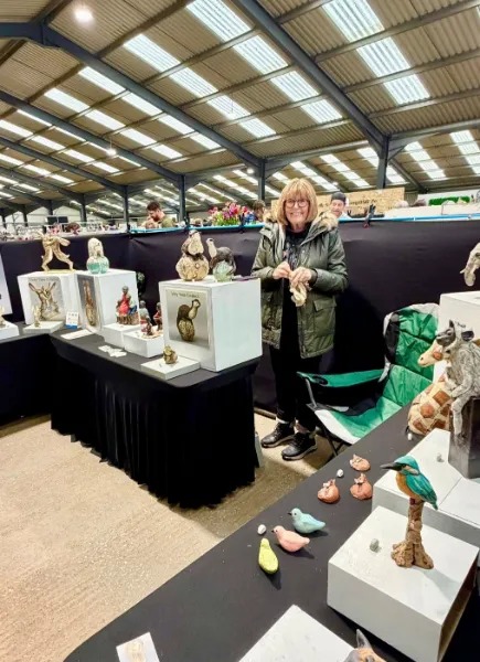Visitors at Cromartie stand Potfest Penrith 2025