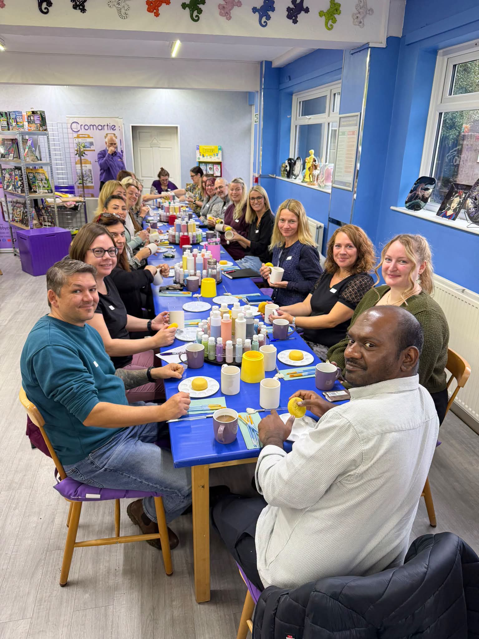 Customers taking part in a Paint Your Own Pottery business training day at Studio 70, Cromartie Hobbycraft